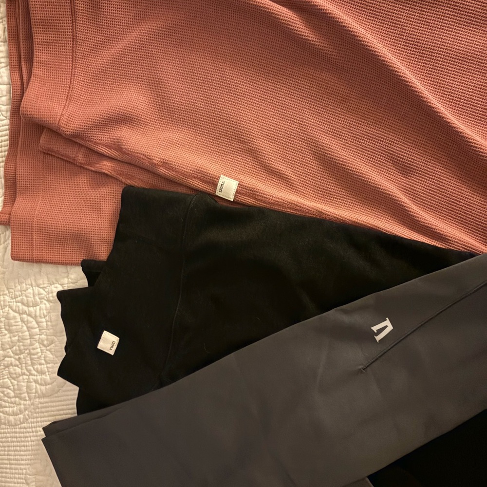 Vuori Wide Leg Pants and Jumpsuit Pieces in Black, Dusty Rose, and Charcoal